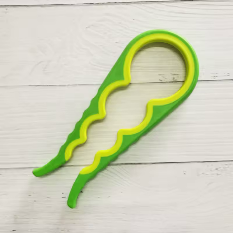 Ergonomisk burköppnare 4-i-1 i grönt